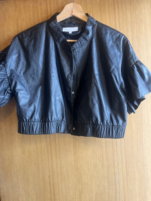 Casaco de pele preta de senhora