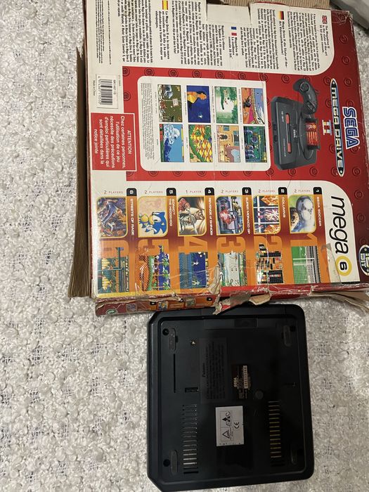 Mega drive ll com caixa original e comando/ ps2 com comando avariado e jogos
