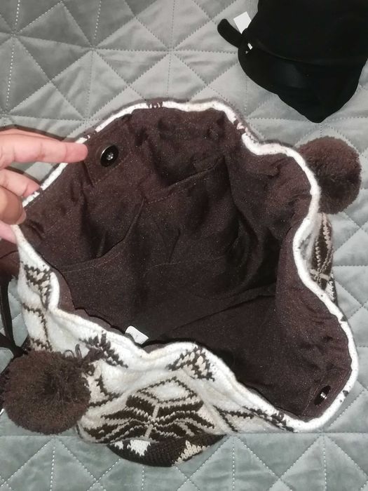 Malas em couro e malha