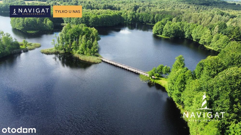 Teren inwestycyjny z linią brzegową jeziora