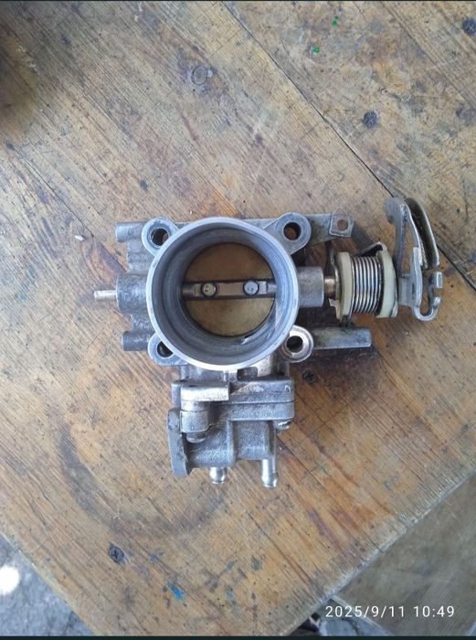 Продам дросильную заслонку