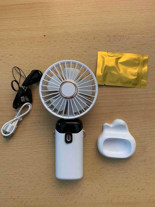 Mini Portable mini Fan with 1 to 5  high Speed Modes USB Rechargeable.(NEW)