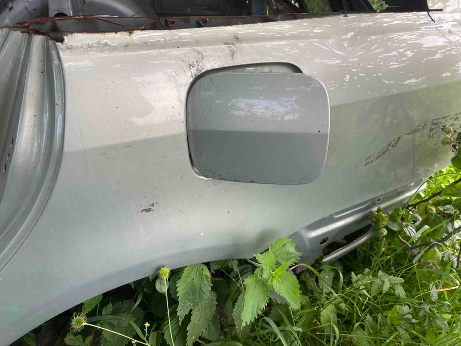 Задня ліва четверть крило Тойота Авенсіс т25 універсал