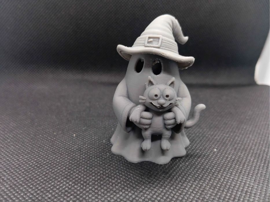 Decorative Ghost Figure Holding a Cat for Halloween