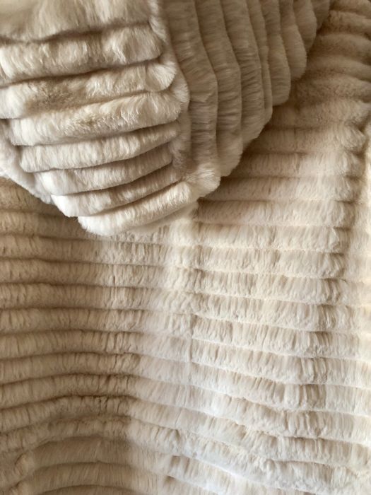 Colete em pele de coelho