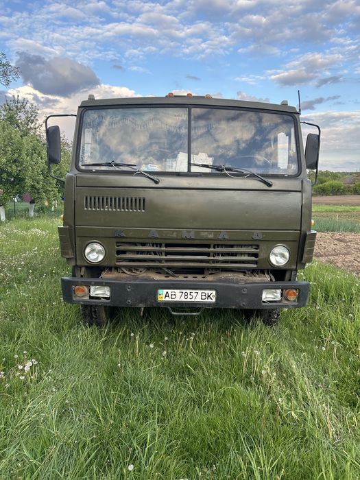 Камаз самоскид з причепом.