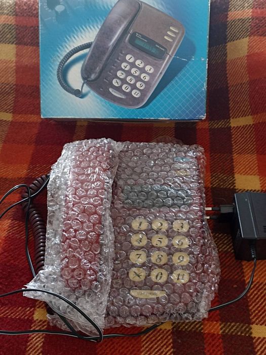 Телефон кнопочний