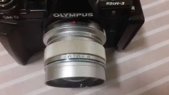 Objectiva Olympus Zuiko 12mm f2