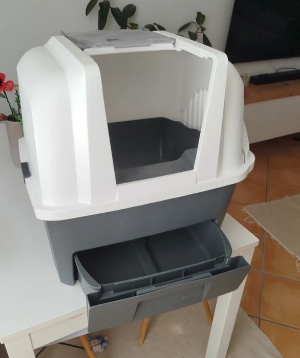 Caixa de areia basculante