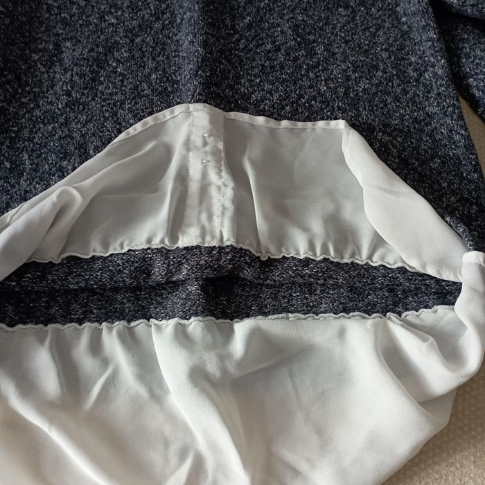 Casaco em lã, com detalhes em viscose
