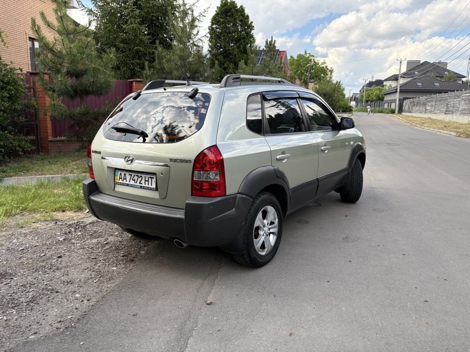 Hyundai Tucson 2006 VIN KMHJN81BP7U556111 фото оголошення 2 з 8