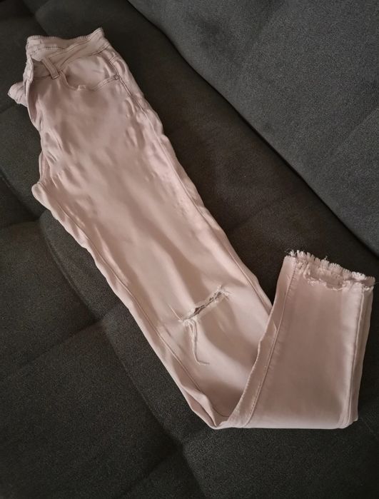 Spodnie z dziurami szarpane nogawki brudny pudrowy róż Pink Kiss S