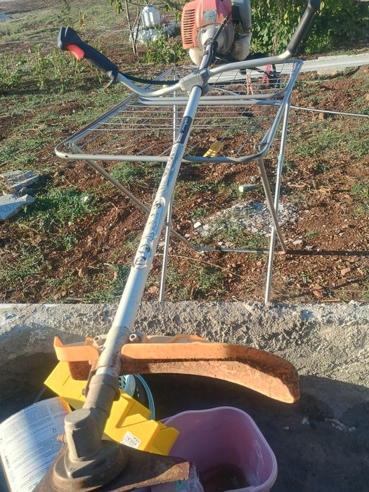 Vendo roçadeira poço usada