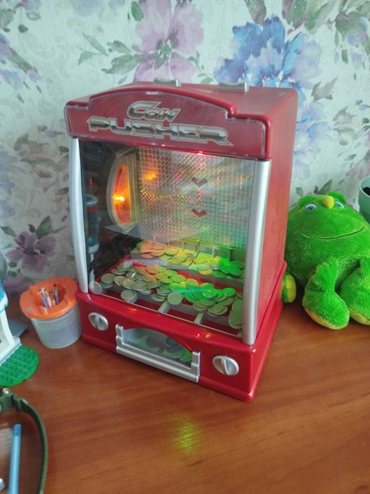 Штовхав монет ігровий автомат