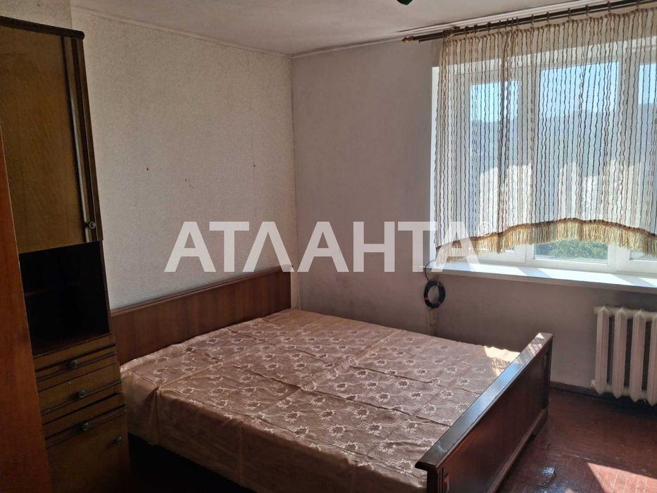 Комната 23,5 кв. в коммунальной квартире на среднем этаже в Лузановке.