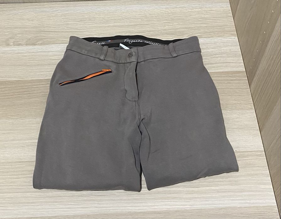Brązowe bryczesy dziewczęce Fouganza nogawka 72cm
