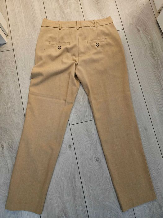 Spodnie garniturowe kremowe