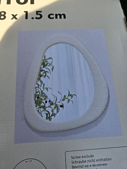 Novos espelhos com rebordo bouclé