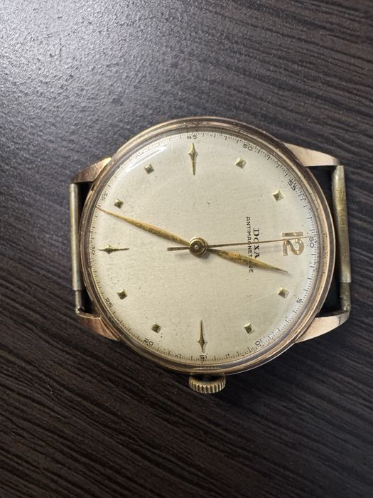 Złoty zegarek Doxa 5277,906  14k 29,15 gr. 585