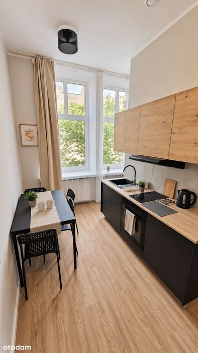 Duża kawalerka ~30 m², osobna kuchnia | Rewolucji 40 | podwórko