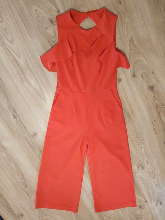 Elegancki długi kombinezon 36 s