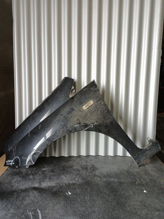 Guarda Lamas Fiat Grande Punto ESQUERDO  Preto