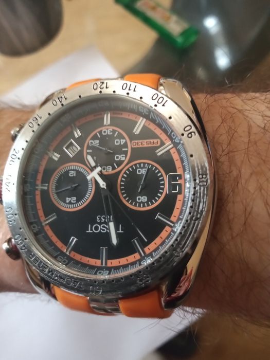 Zegarek marki Tissot srebrno pomarańczowy