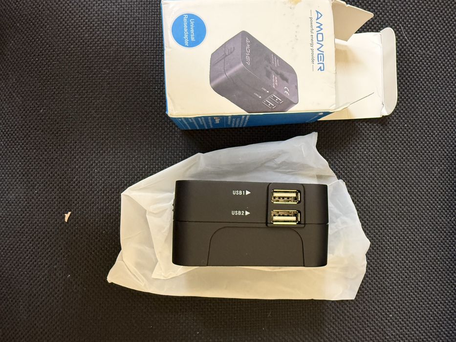 Універсальний туристичний адаптер живлення AMONER HHT202 з 2 USB, дорожній перехідник