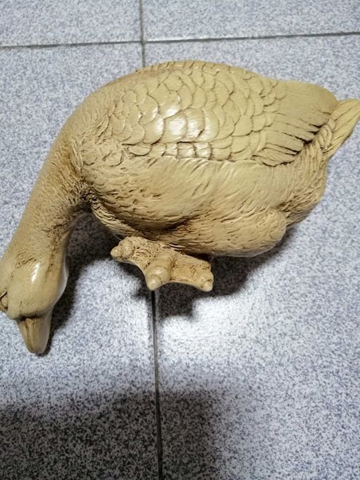 estatueta em forma de pato