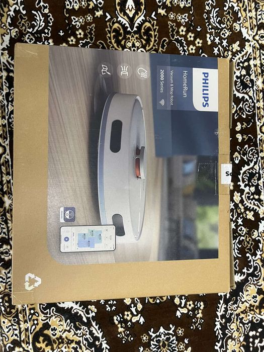 Робот пилосос миючий.