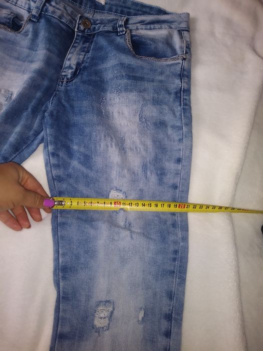 Spodnie jeans 40.        14