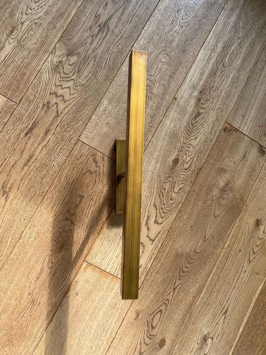 złoty kinkiet obrazowy