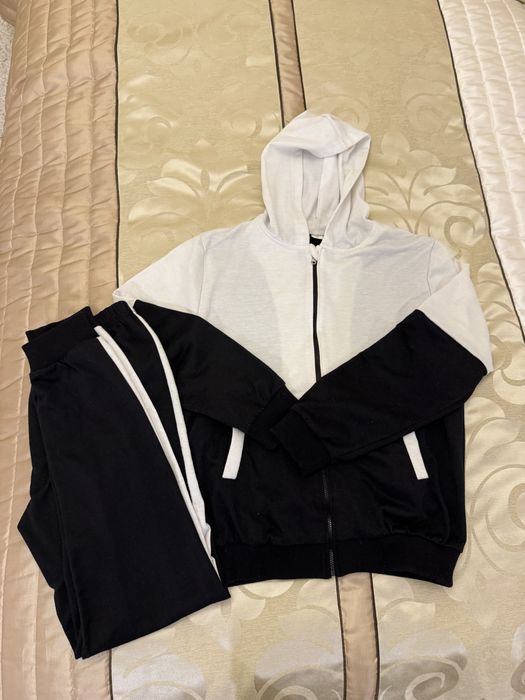 Dres chłopięcy biało-czarny 160 cm