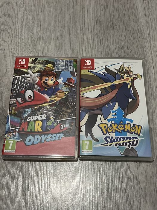 Zestaw Nintendo Switch + 2 gry + paletki