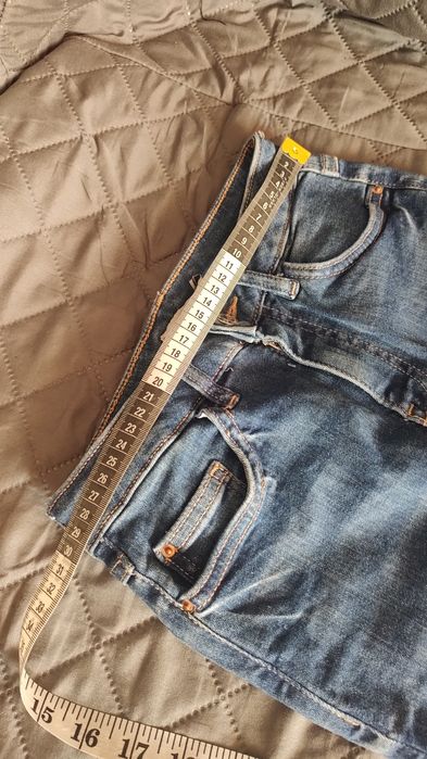 Spodnie z przetarciem DenimCo XS