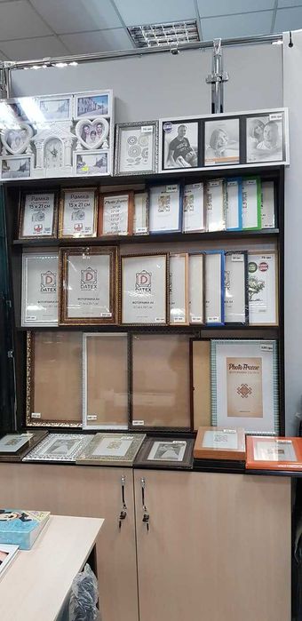 Фоторамки нові пластикові та дерев'яні та фотоальбоми