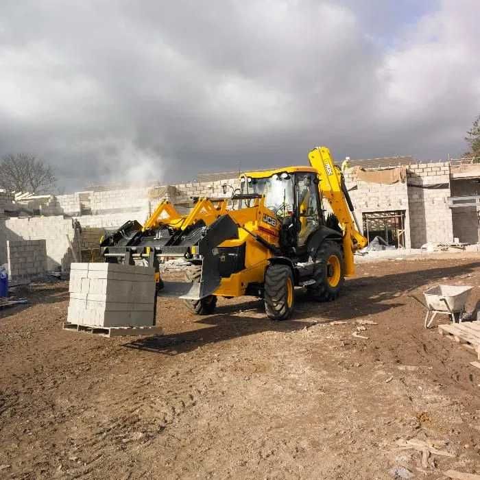 Wykopy, prace ziemne, koparko-ładowarka, minikoparka