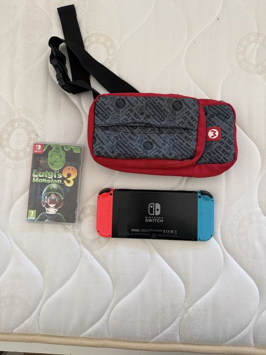 Nintendo Switch com bolsa + 1 jogo