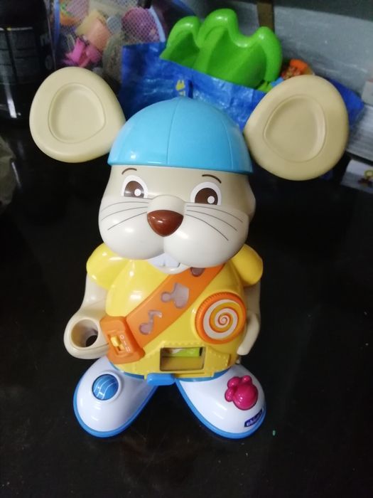 Boneco musical Chicco