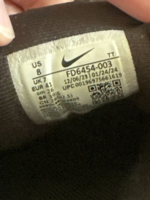 Sapatos pretos da nike