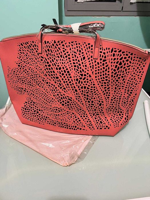 Mala Coral, cortada a laser