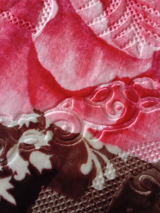 Ковдра або плед тепле