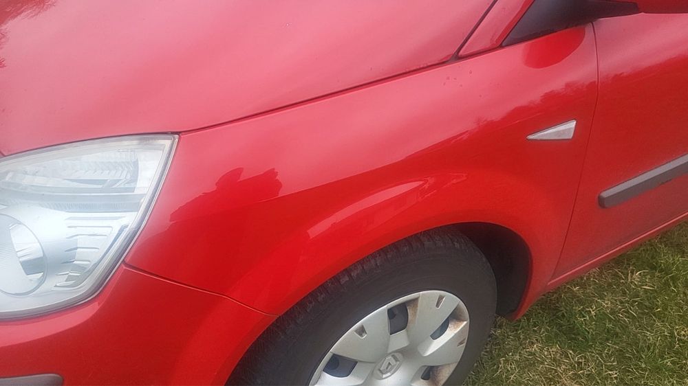 Blotnik lewy przod Renault scenic II LIFT, dv727