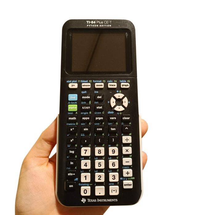 Texas Instruments TI-84 Plus Python + pudełko, dedykowana ładowarka, instrukcje