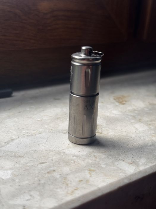 Latarka  Olight  IXV  Tytan 180 lumenów