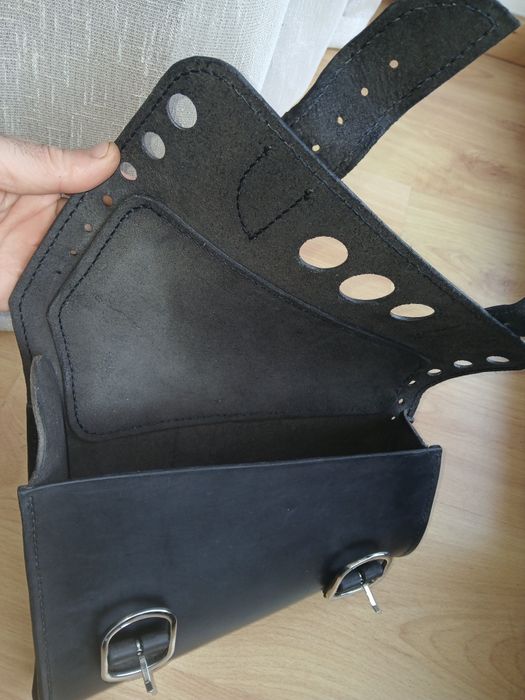 Alforge de braço oscilante