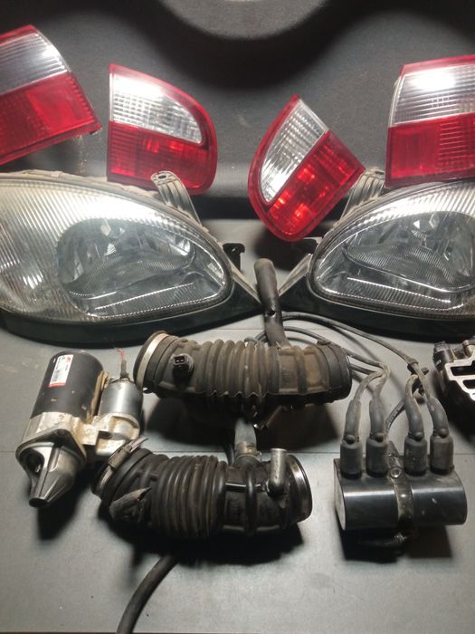 Lanos rozrusznik lampy cewka dolot pompka przepustnica półka