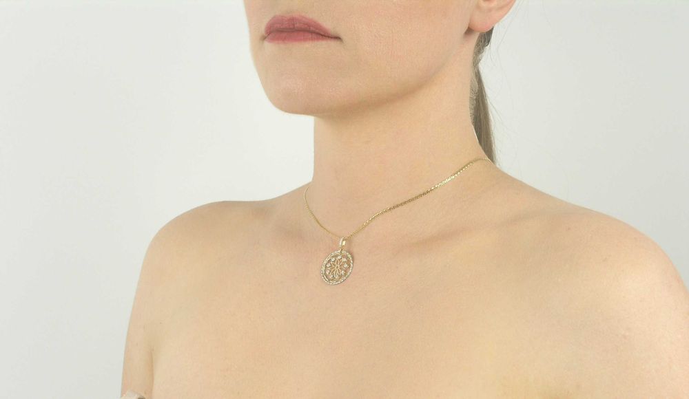 Złoty  diamentowany wisiorek z cyrkoniami pr 585