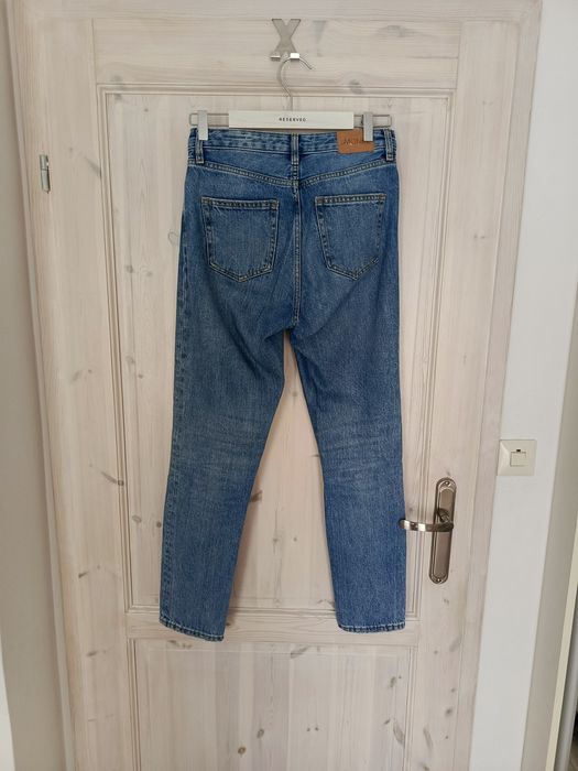 Jeansowe dżinsowe spodnie mom fit niebieskie Monki 36 S
