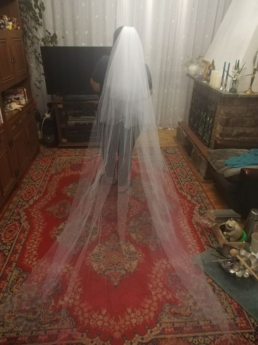 Boho suknia ślubna muślinowa plus size z welonem.